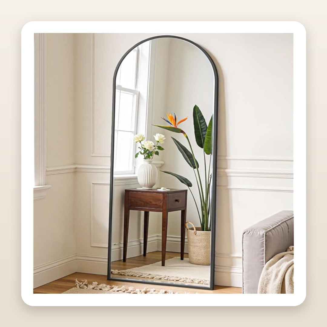 This 64-Inch Arched Black Mirror Is the Statement Piece Your Room Is Missing