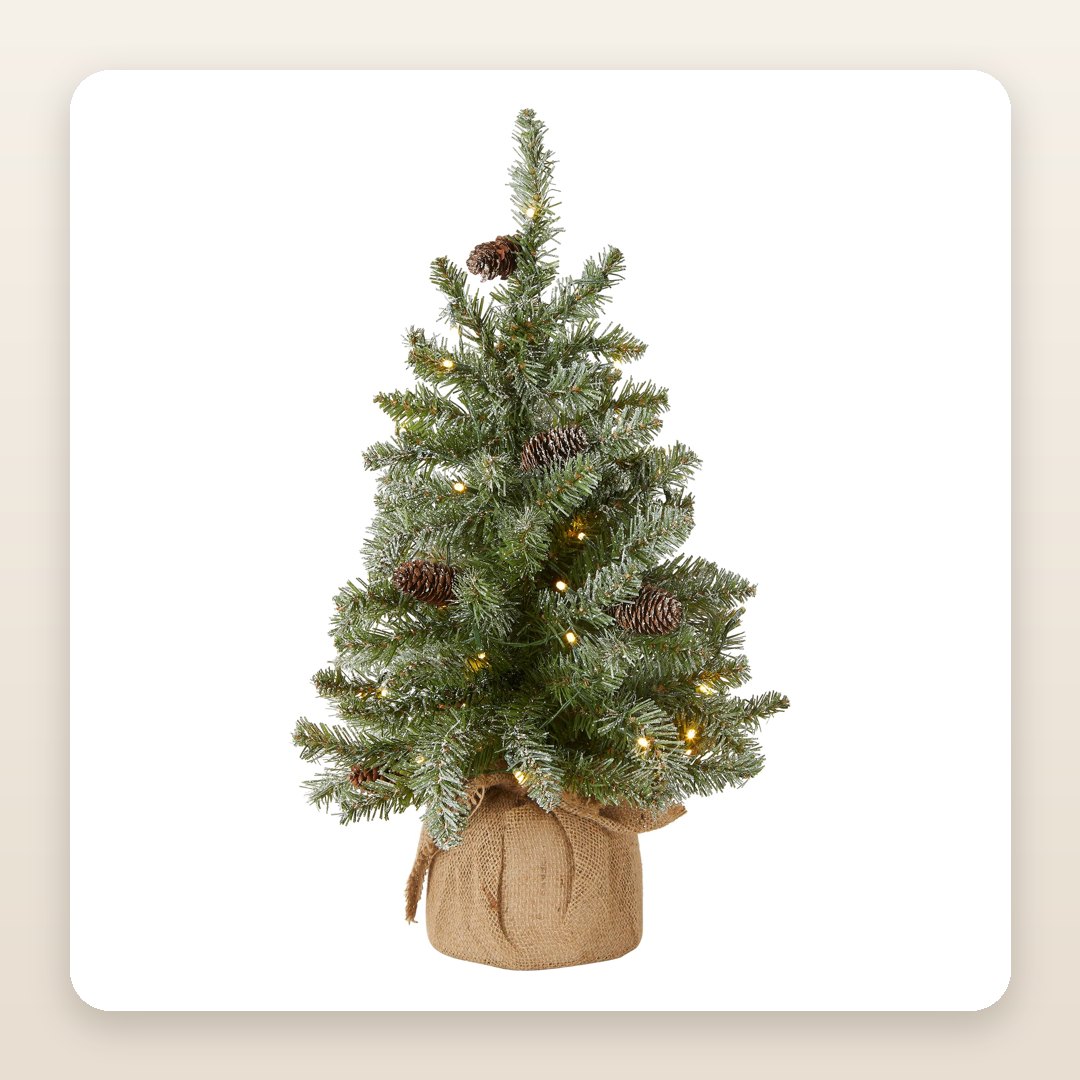 Christmas Tree Ideas 2026: The 2-Foot Flocked Tree That Fits Where a Big One Won't