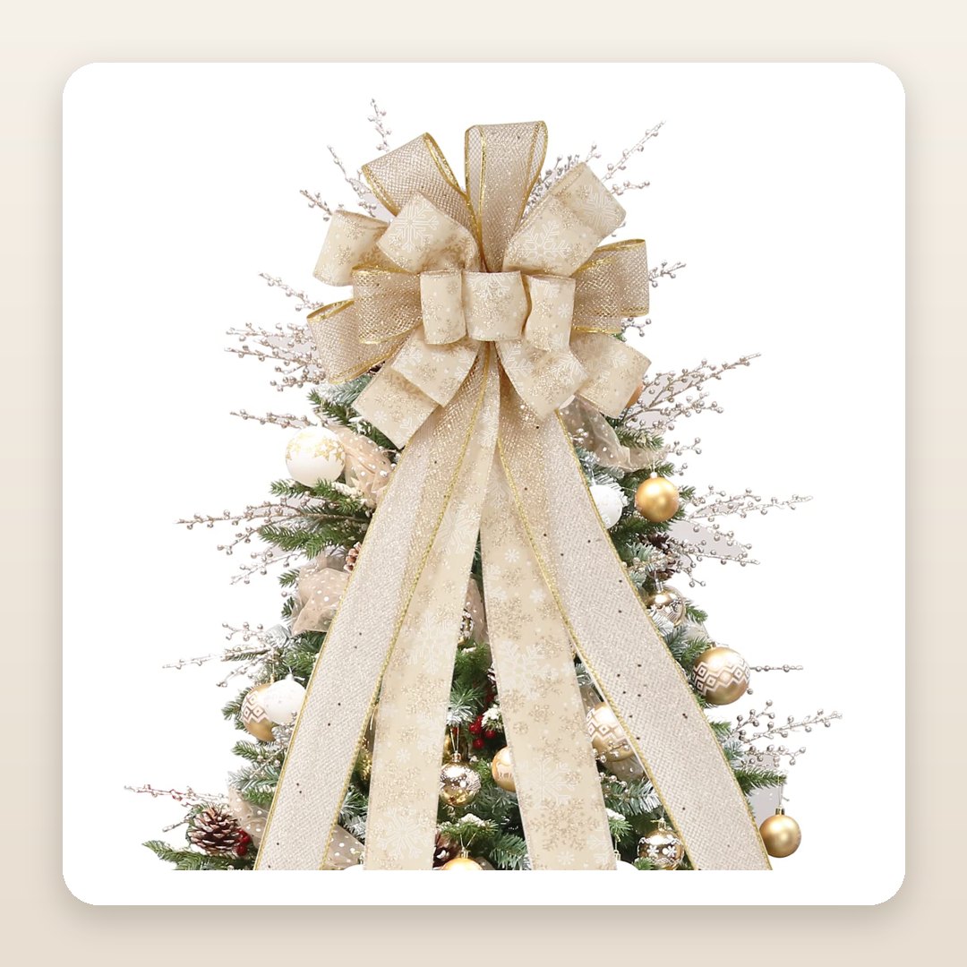 Christmas Tree Ideas 2026: The Gold Tree Topper Bow With Tails That Run Down the Branches